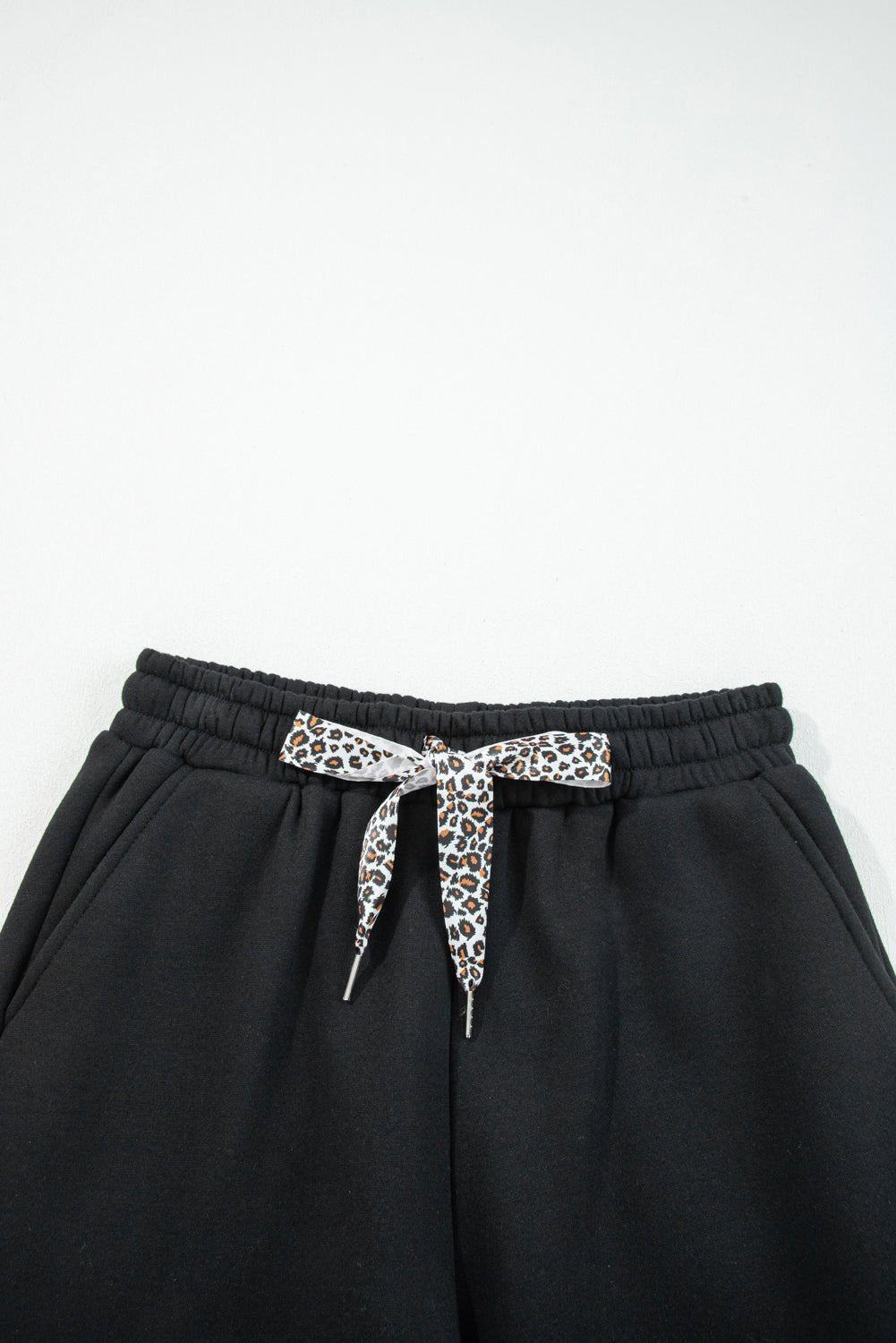 Black Fleece Lined Leopard Drawstring Elastic Waist Solid Pants - Crowned Energy CO.